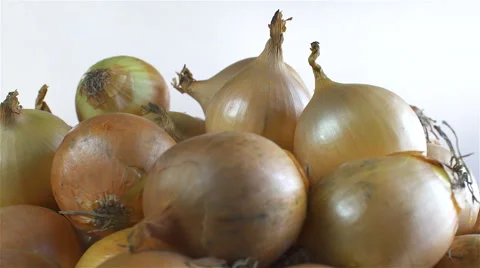 Onions isolated rotating on white background Stock Footage 62389421