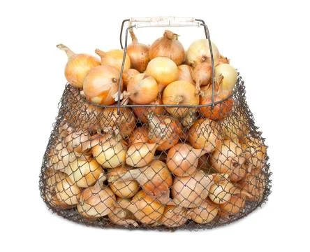 Onions in the mesh bag Stock Photos