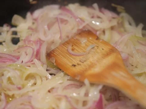 Onions in a pan Stock Photos