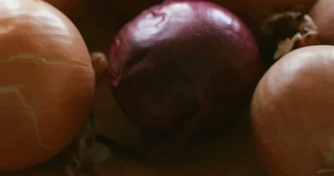 Onions on rotating stand, close-up Stock Footage 121306647