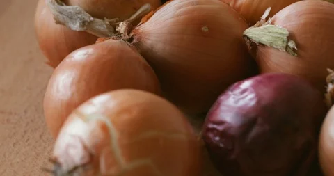 Onions on rotating stand, close-up Stock Footage 121306679