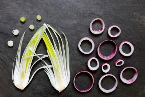 Onions on slate Stock Photos