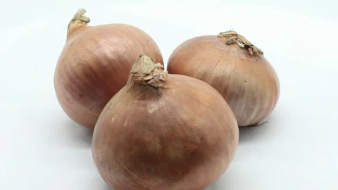 Onions on white background Stock Footage 141261979
