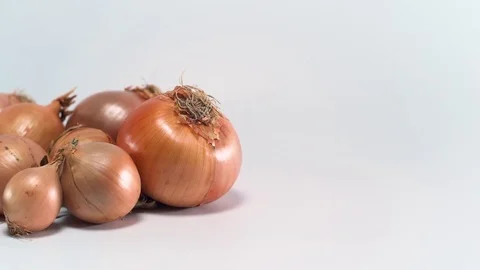Onions on white background, sliding 스톡 동영상 75729898