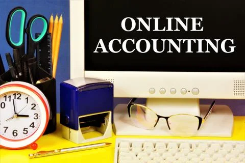 Online accounting. Text caption on the computer monitor. Stock Photos
