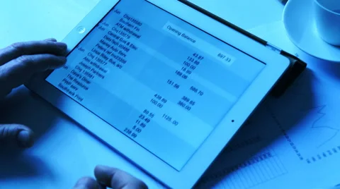 Online banking on tablet, cool toned Stock Footage 61818975
