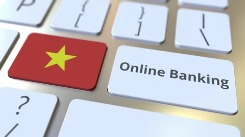 Online Banking text and flag of Vietnam on the keyboard. Internet finance Video stock 127634028