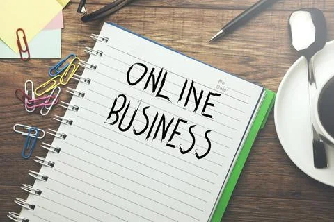 Online business text on notebook Foto stock