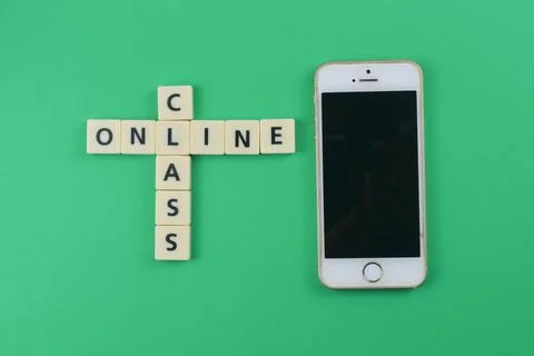 Online class wording with green background. Education concept Stock Photos