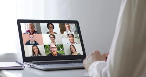 Online conference of colleagues through a laptop. Video call for training. Stock Footage