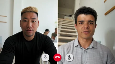 Online conversation with two participants in a split screen Stock Footage 310963665