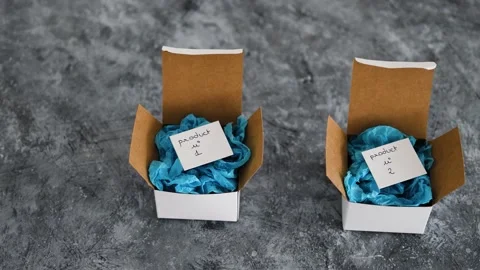 Online delivery parcel boxes with Product 1 and 2 on tags, competitions and c Stock Footage 163143765