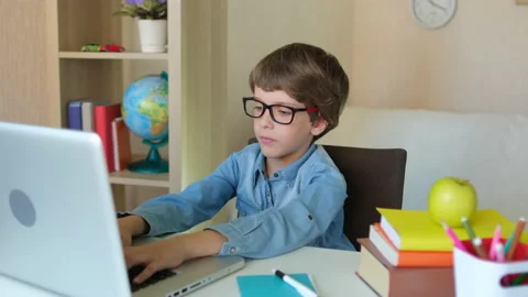 Online distance education learning lesson concept. Child Boy Kid schoolboy in Stock Footage 132741865