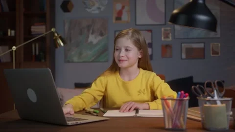Online distance education learning lesson concept. Child girl Kid in room using Stock Footage 150428799