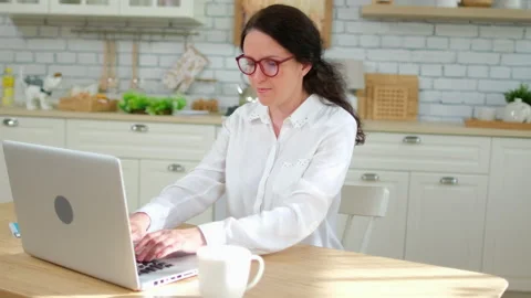 Online distance learning concept. Young woman girl student freelancer Stock Footage 132704876