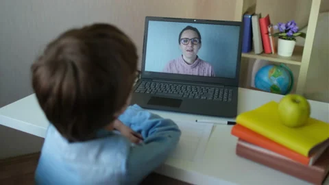 Online distance learning education lesson concept. Child Little Boy Kid Stock Footage 132747671