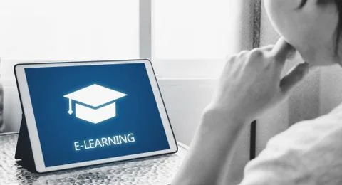 Online education, e-learning and e-book concept. a man using digital tablet Stock Photos