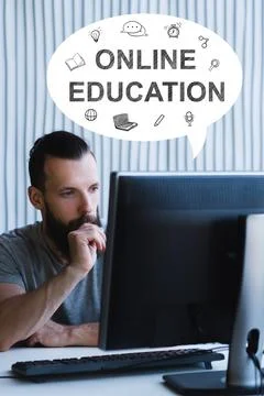 Online education e-learning technology pensive man 写真素材