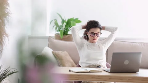Online education problems lady student stretches arms Spbi Stock Footage 157135429