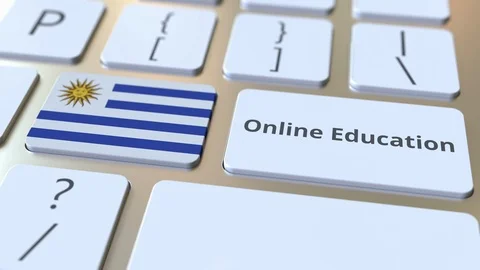 Online Education text and flag of Uruguay on the buttons on the computer Stock Footage 126097075
