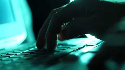 Online Hacker Or Troll Man Typing Late At Night On Laptop Stock Footage 148922733