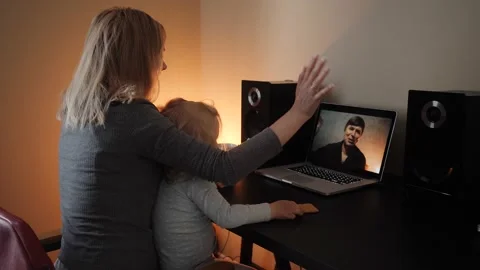 Online interaction via video link with relatives Stock Footage 131009550