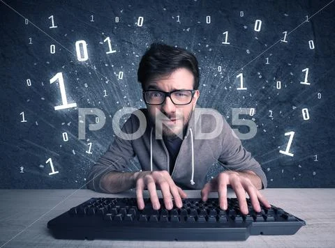 Online intruder geek guy hacking codes Stock Photos