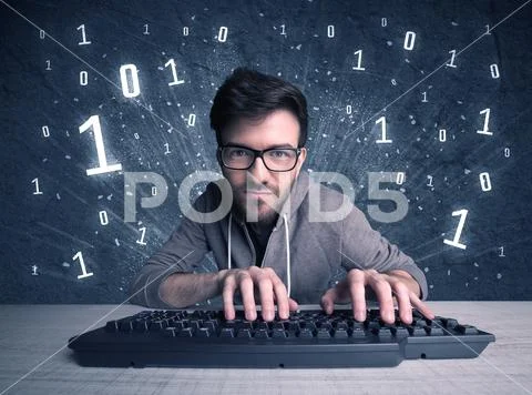 Online intruder geek guy hacking codes Stock Photos