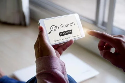 Online job search, hand hold smartphone to search job vacancy Stock Photos