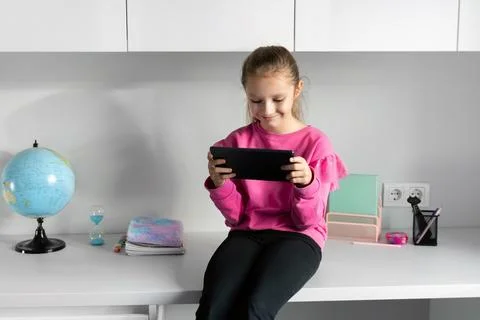 Online learning, digital school, and educational technology at home Fotos Stock