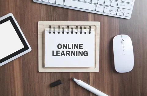 Online Learning text in notepad with a business objects. Stock Photos