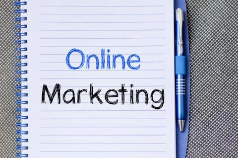 Online marketing write on notebook Stock Photos