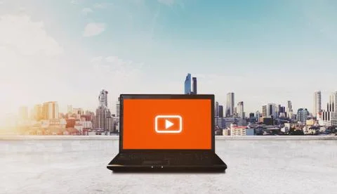 Online media and application technology. Computer laptop on rooftop Stock Photos