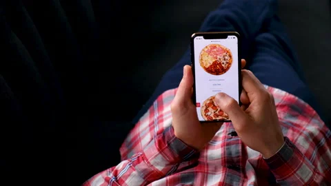 Online ordering pizza by phone. selective focus. Stock Footage 149846610