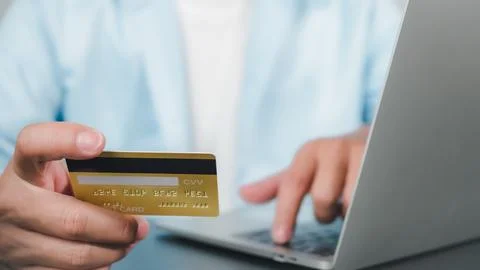Online payment, Man using computer and credit card for online shopping, Dig.. Stock Photos