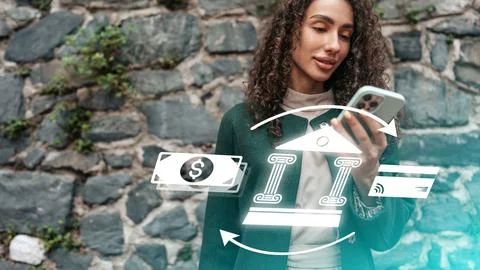 Online payment process with a person checking their phone near a stone wall Stock Photos