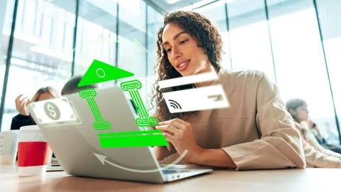 Online payment process taking place at a modern office during the day with a Stock Photos