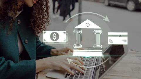 Online payment process using a laptop on a street with digital banking icons Stock Photos