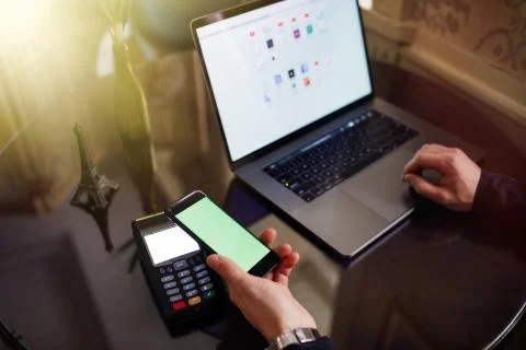 Online payment by using notebook with sun light effect. Stock Photos