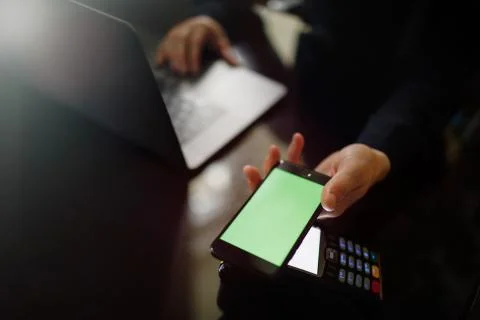 Online payment by using notebook with sun light effect. Stock Photos