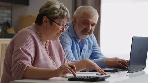 Online payment of utility bills, users are using laptop with internet for paying Stock Footage 153400213