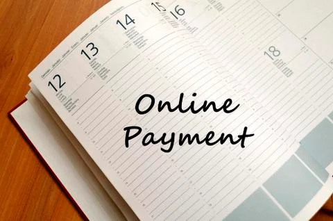 Online payment write on notebook Stock Photos