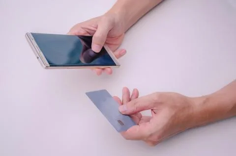 Online payment, young man using smart phone for online shopping Stock Photos
