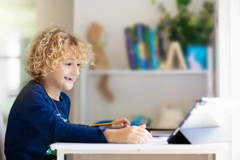 Online remote learning. School kids with computer. Foto stock