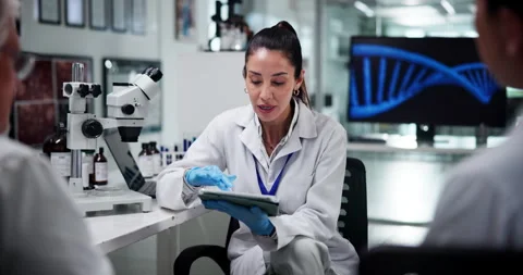 Online, scientist and group with tablet, lab and discussion for medical research Видео 305796877