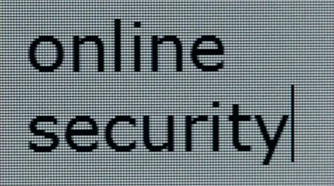 "online security" typed on computer screen, individual pixels visible Stock Footage 54701299