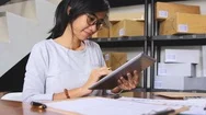 Online Shop Seller Working At Home Office Stock Footage
