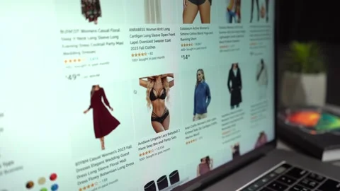 Online Shopping. Browsing through online retail shopping site Stock Footage 258612997