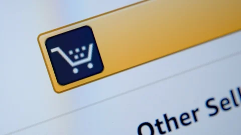 Online shopping. Close up of adding Item to a Shopping Cart Icon on Screen Vídeo Stock 124501152