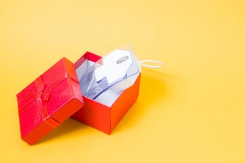 Online shopping concept, computer mouse made of transparent plastic in a red  Stock Photos